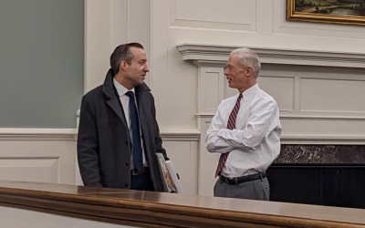 Attorney General John Formella and Chief Supreme Court Justice Gordon MacDonald talk at the New Hampshire Supreme Court (source Plaintiff Dana Albrecht)
